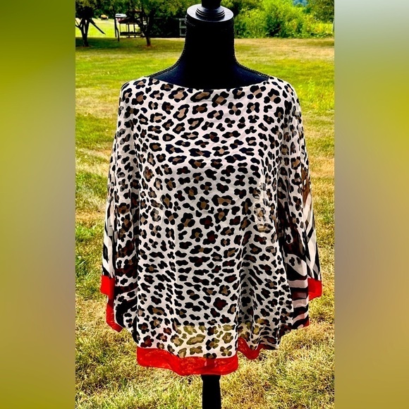Nordstrom’s Tarnish OS Fits Most
Poncho Shawl Wrap Animal Print Leopard New Tags - Picture 1 of 9